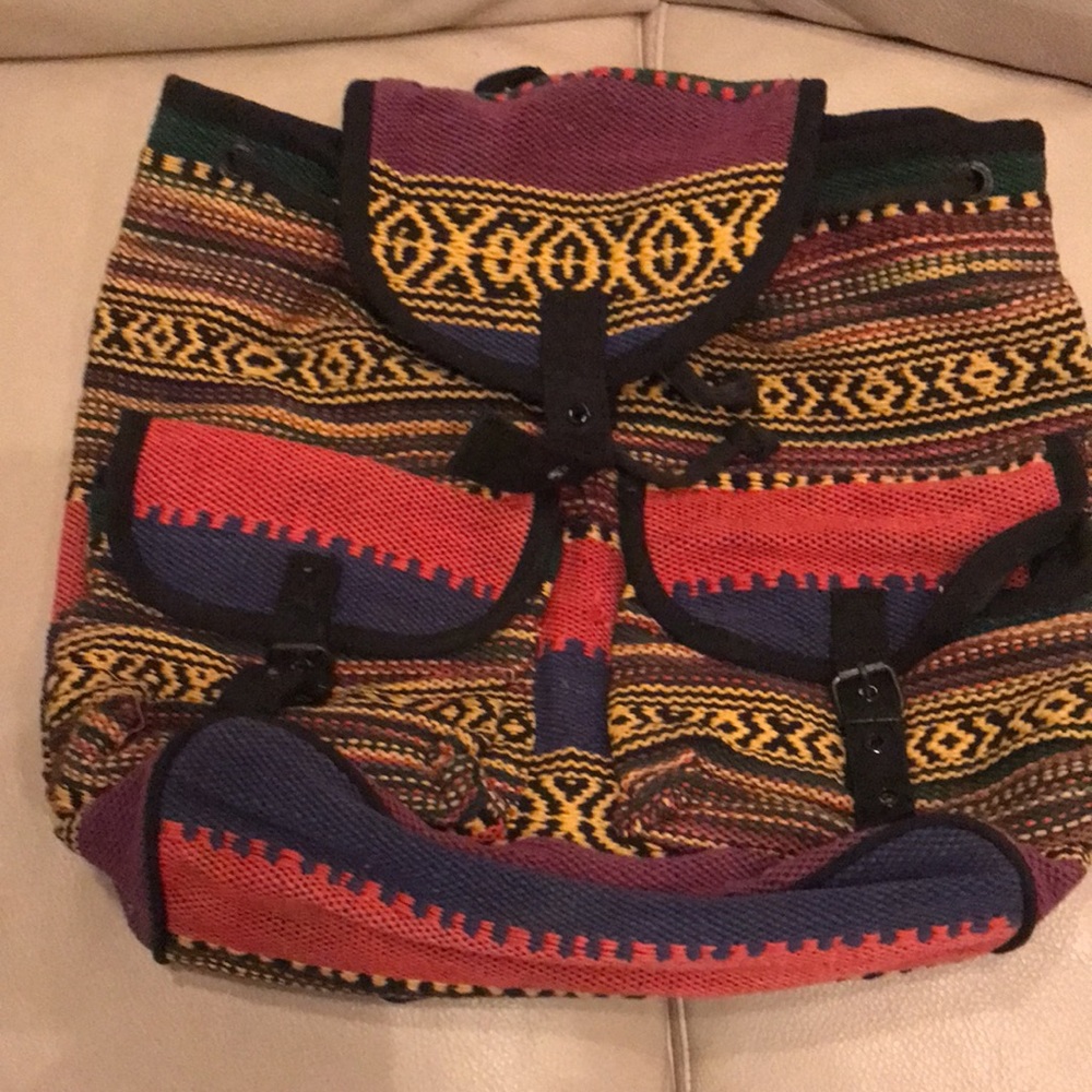 Backpack- Canvas w/ 2 Front Pockets. Perfect for laptops or books.